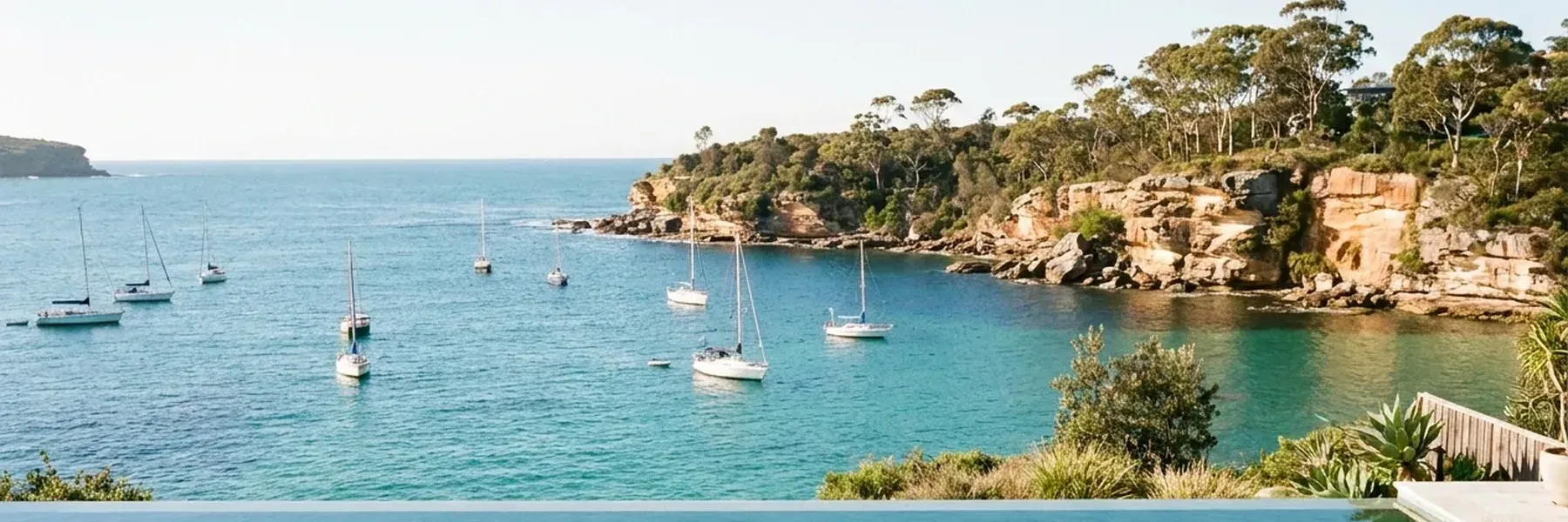 Sailing boats moored in a sheltered Australian harbour bay